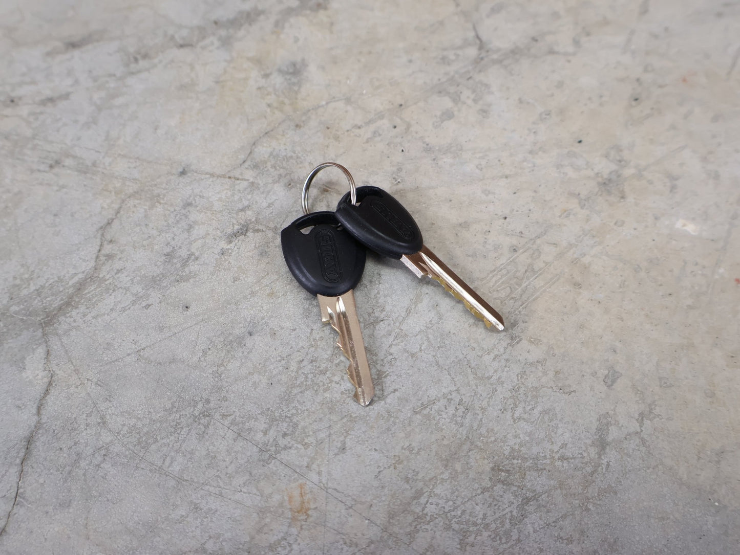 Fahrradschlösser von Abus, ABUS BORDO LITE 6055 MINI / 85 CM – FALTSCHLOSS – SECURITY LEVEL 7 – INKL. SH 6055 HALTER – SCHWARZ vor USEDBIKES - OB.DE Hintergrund