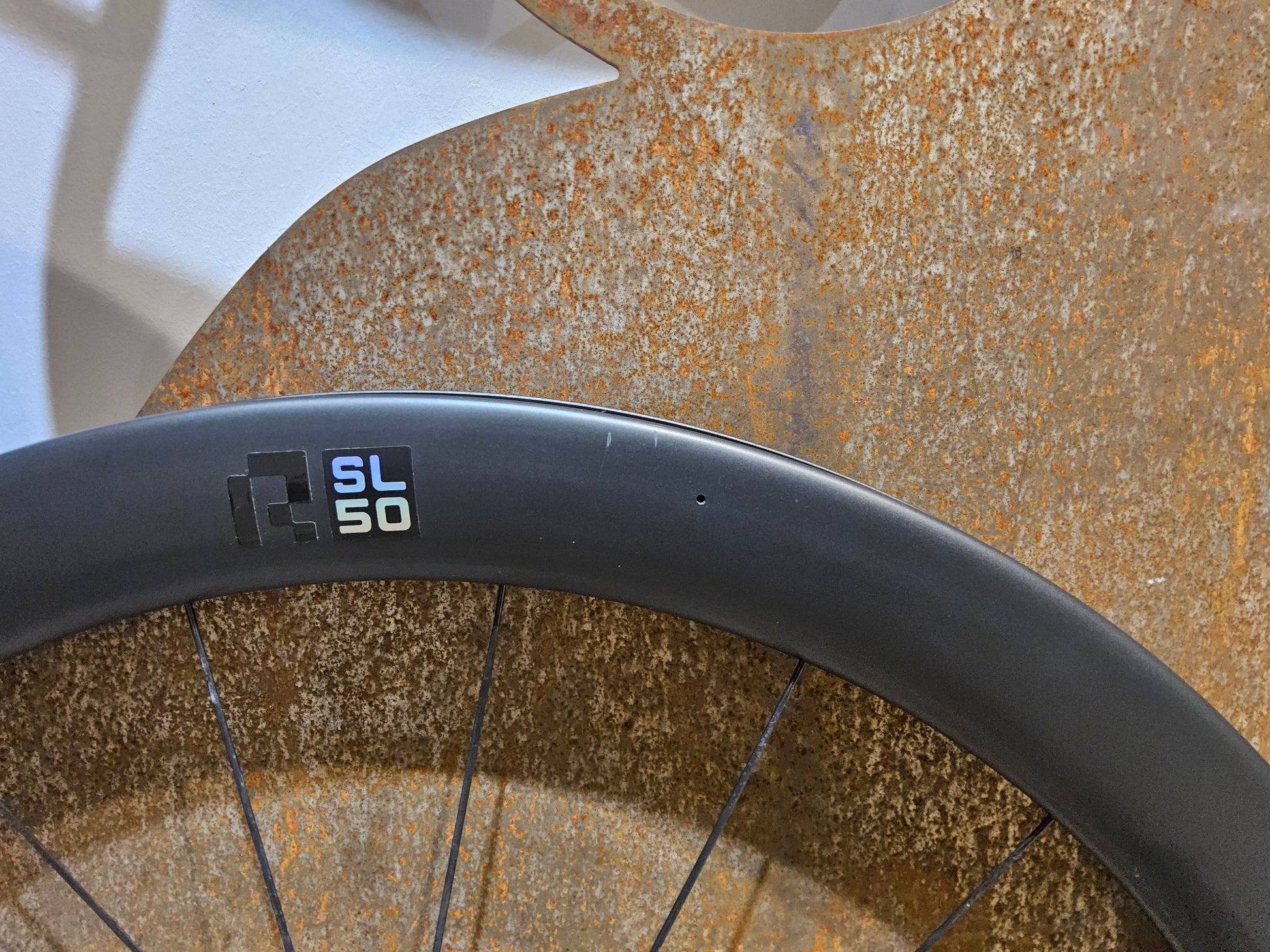 Laufrad/Laufradsatz von Cannondale, CANNONDALE HOLLOWGRAM R - SL 50 LAUFRADSATZ DISC vor USEDBIKES - OB.DE Hintergrund