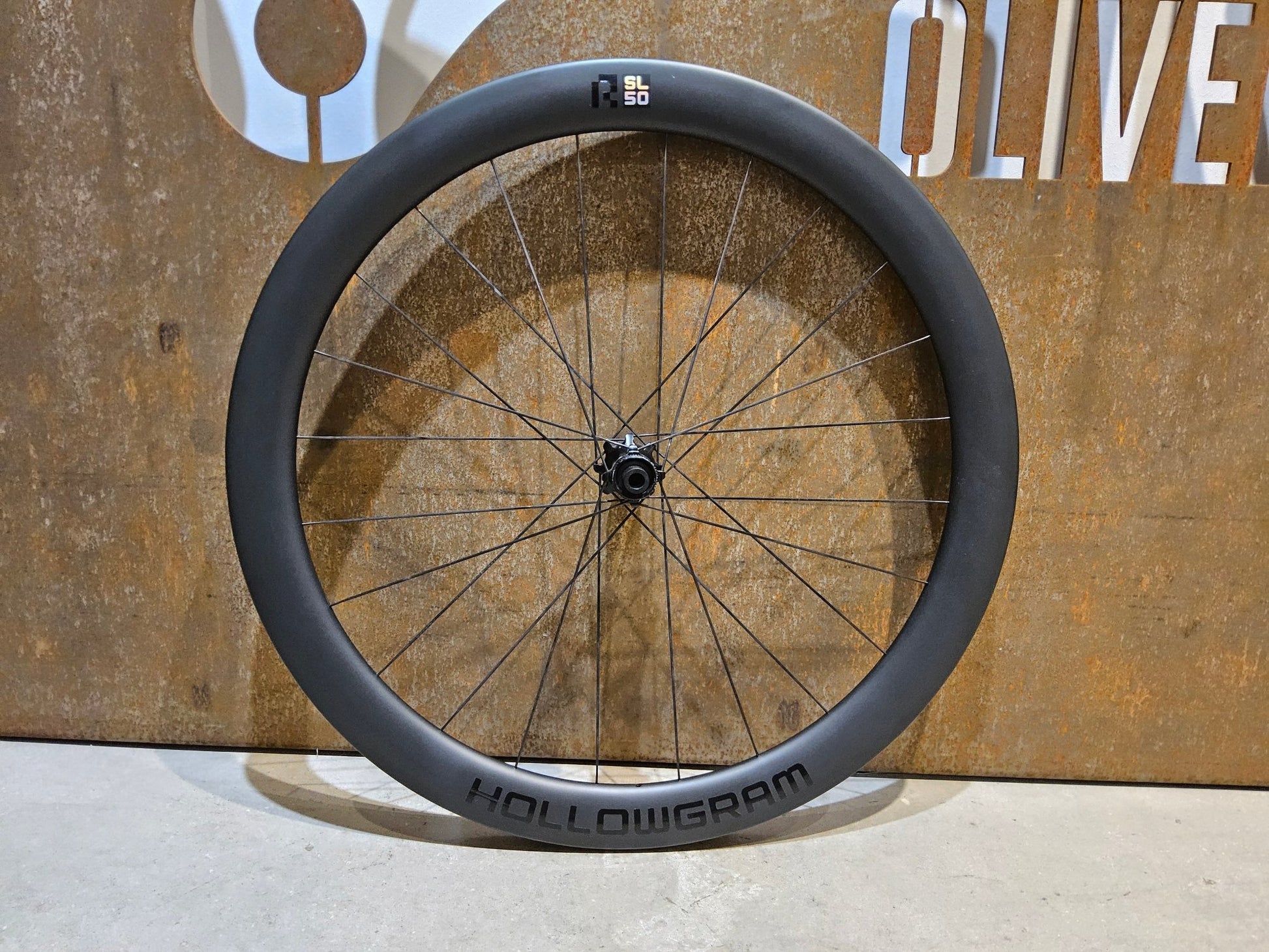 Laufrad/Laufradsatz von Cannondale, CANNONDALE HOLLOWGRAM R - SL 50 LAUFRADSATZ DISC vor USEDBIKES - OB.DE Hintergrund