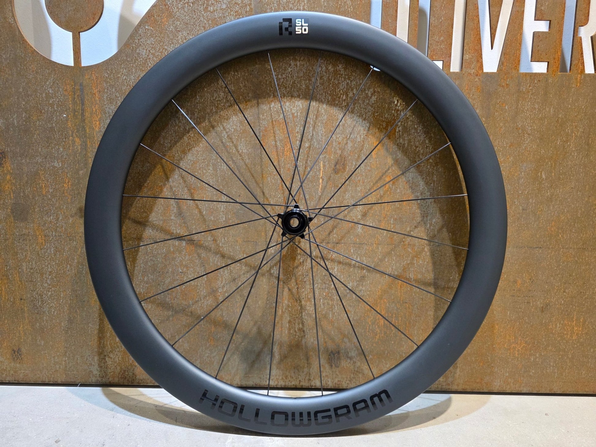 Laufrad/Laufradsatz von Cannondale, CANNONDALE HOLLOWGRAM R - SL 50 LAUFRADSATZ DISC vor USEDBIKES - OB.DE Hintergrund