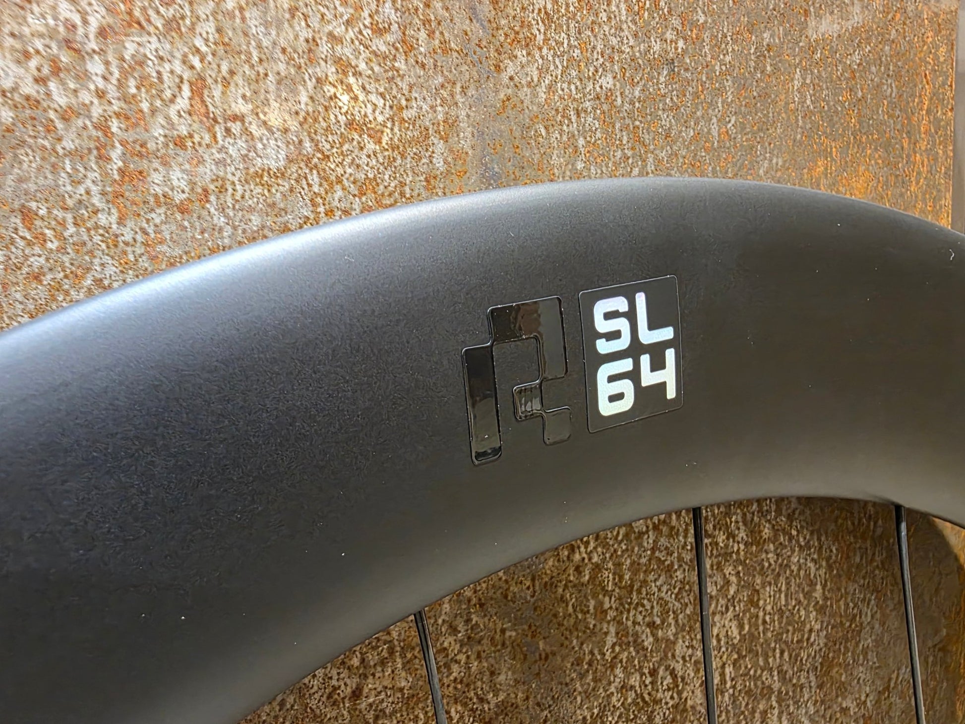 Laufrad/Laufradsatz von Cannondale, CANNONDALE HOLLOWGRAM R - SL 64 LAUFRADSATZ DISC vor USEDBIKES - OB.DE Hintergrund