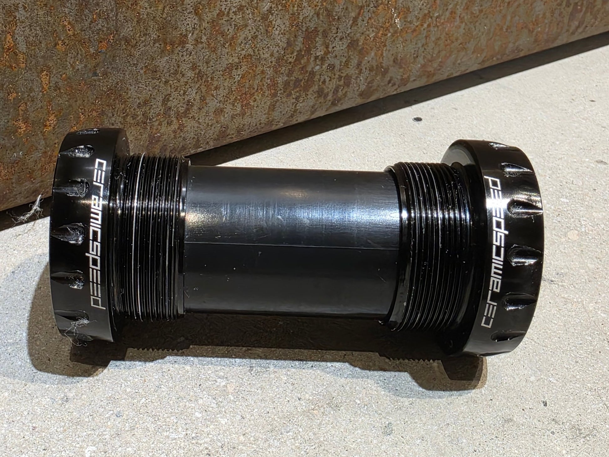 Innenlager von Ceramicspeed, CERAMICSPEED INNENLAGER COATED BSA SHIMANO 24MM vor USEDBIKES - OB.DE Hintergrund