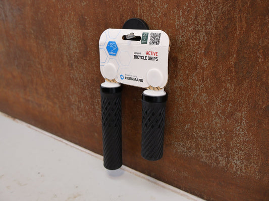 Griffe und Lenkerbänder von Herrmans, HERRMANS LUNA LOCK GRIFFE 130/90MM SCHWARZ SCHALTGRIFF 22MM vor USEDBIKES-OB.DE Hintergrund