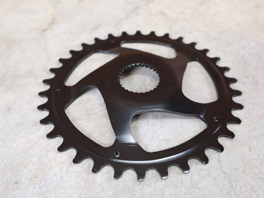 Kettenblatt von Kmc, KMC BOSCH GEN 4 E - BIKE KETTENBLATT 34T – 11/128" / 52 MM KETTENLINIE / CRMO vor USEDBIKES - OB.DE Hintergrund