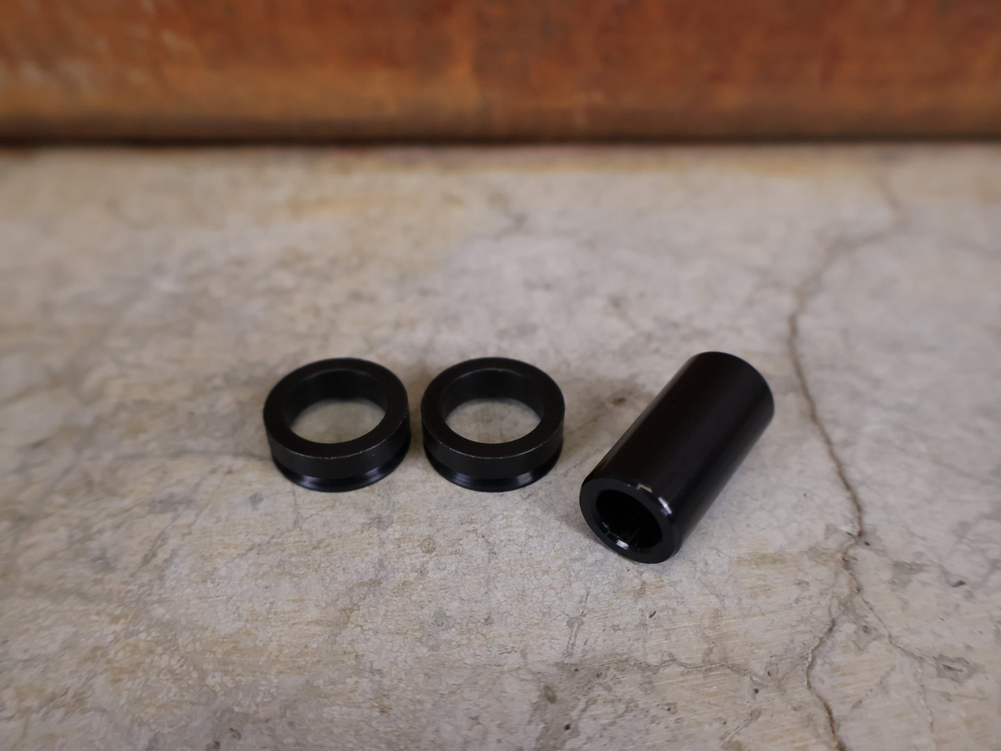 Zubehör von Rock Shox, ROCKSHOX – DÄMPFERBUCHSEN SET 1/2" / 8 MM – IMPERIAL & METRIC (00.4118.091.816) vor USEDBIKES - OB.DE Hintergrund