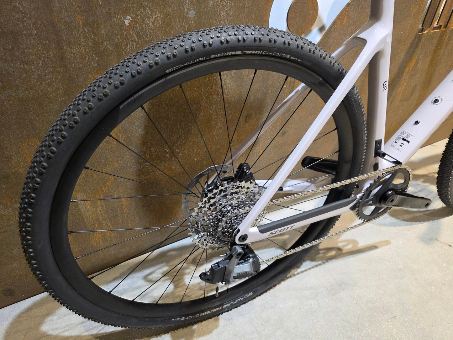 Gravel/Cyclocross von Scott, SCOTT ADDICT GRAVEL 30 / HUSHED PINK / M vor USEDBIKES - OB.DE Hintergrund