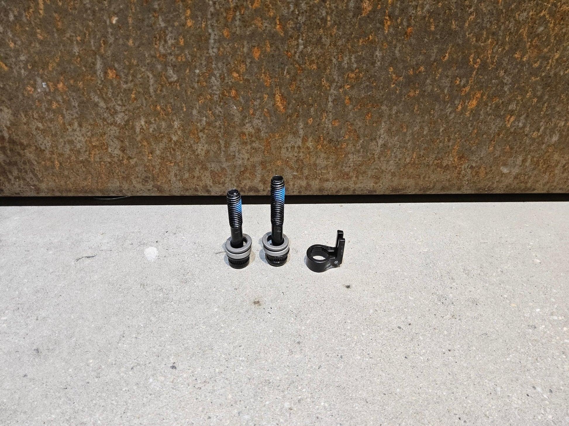 Zubehör von Shimano, SHIMANO ADAPTER POSTMOUNT 203MM / VORNE O. HINTEN vor USEDBIKES - OB.DE Hintergrund