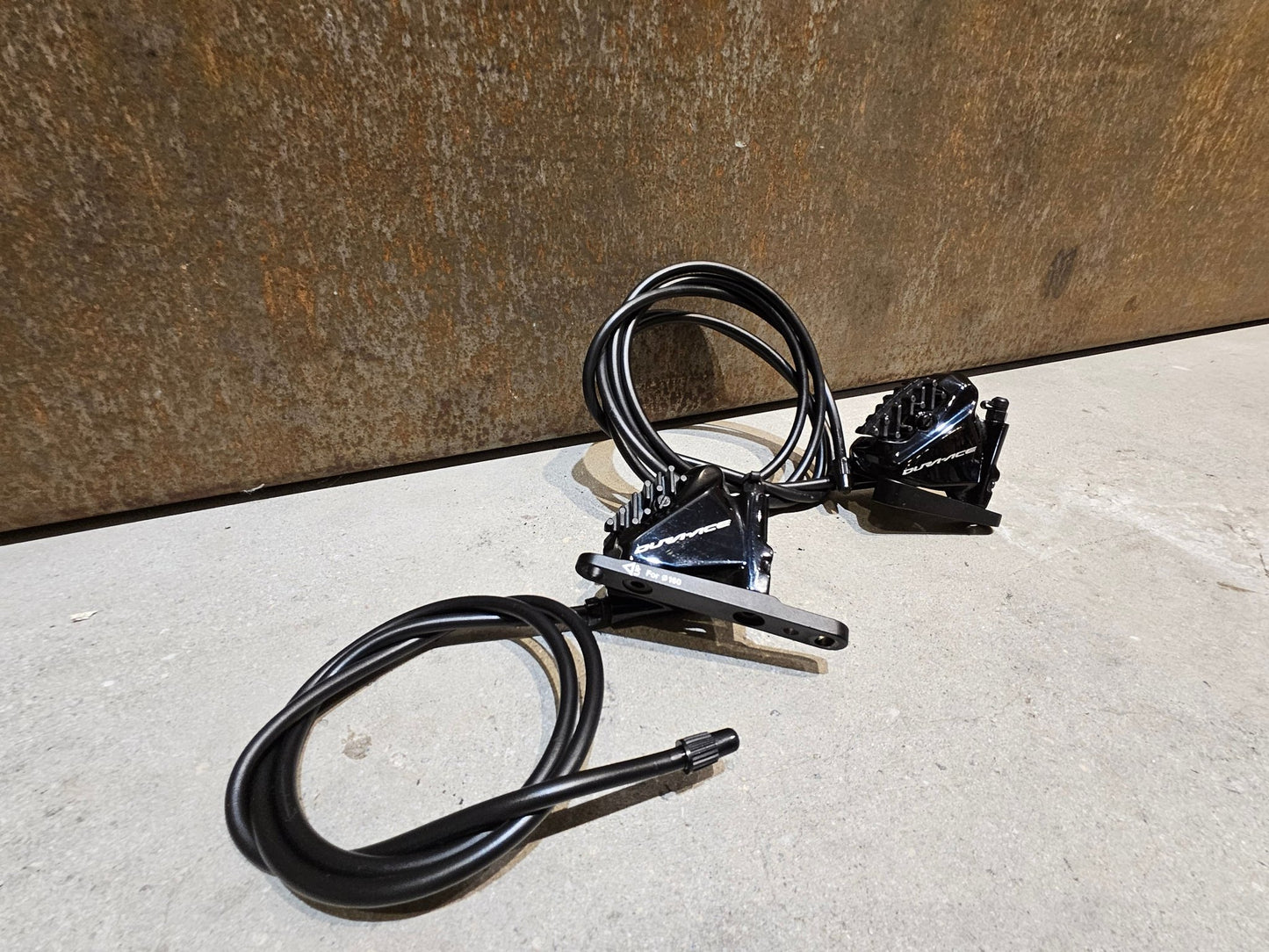 Brems - / Schalthebel von Shimano, SHIMANO DURA ACE DI2 SCHEIBENBREMSEN - SET ST - R9170 + BR - R9170 2 X 11FACH vor USEDBIKES - OB.DE Hintergrund