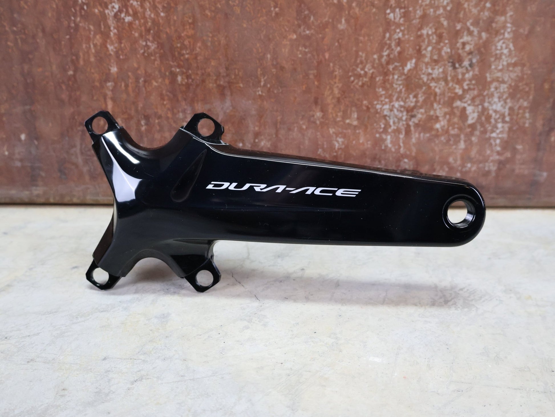 Kurbel von Shimano, SHIMANO DURA ACE FC - R9100 KURBELARME 2X11 FACH 175MM vor USEDBIKES - OB.DE Hintergrund