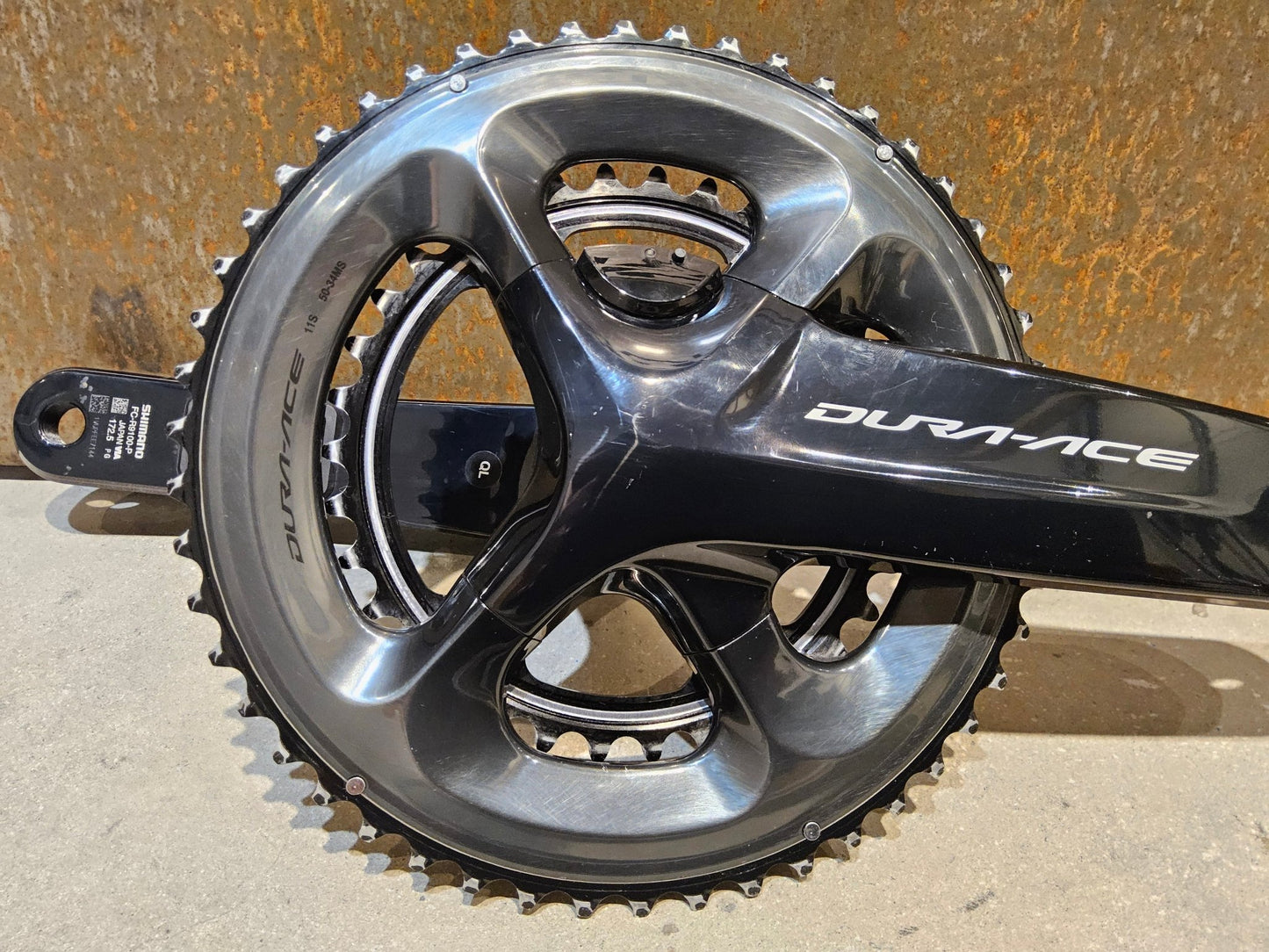 Powermeter von Shimano, SHIMANO DURA ACE FC - R9100 - P POWERMETER KURBEL 50/34 ZÄHNE 172,5MM vor USEDBIKES - OB.DE Hintergrund