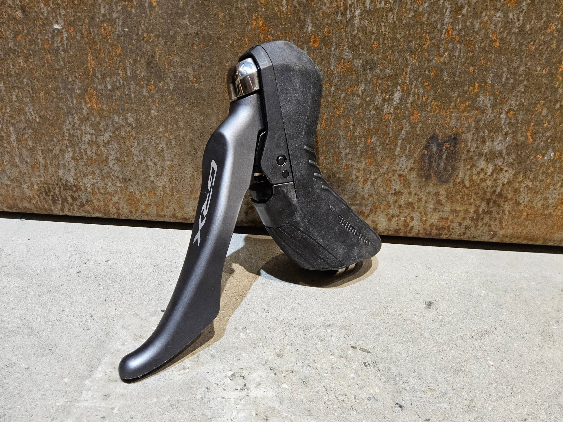 Brems - / Schalthebel von Shimano, SHIMANO GRX BREMSHEBEL BL - RX810 - L / LINKS in variant_title vor USEDBIKES - OB.DE Hintergrund