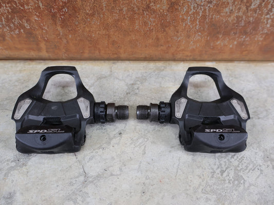 Pedale von Shimano, SHIMANO PD - RS500 SPD - SL PEDALE / RENNRAD / EINSTEIGER - KLICKPEDALE / SCHWARZ vor USEDBIKES - OB.DE Hintergrund