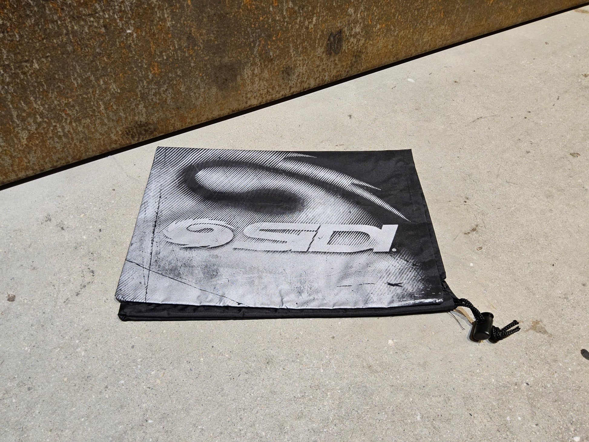 Taschen & Rucksäcke von Sidi, SIDI ZUBEHÖR / SCHUH TASCHE SCHWARZ in variant_title vor USEDBIKES - OB.DE Hintergrund