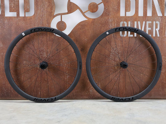 Laufrad/Laufradsatz von Specialized, SPECIALIZED ROVAL RAPIDE C38 LAUFRADSATZ DISC vor USEDBIKES - OB.DE Hintergrund