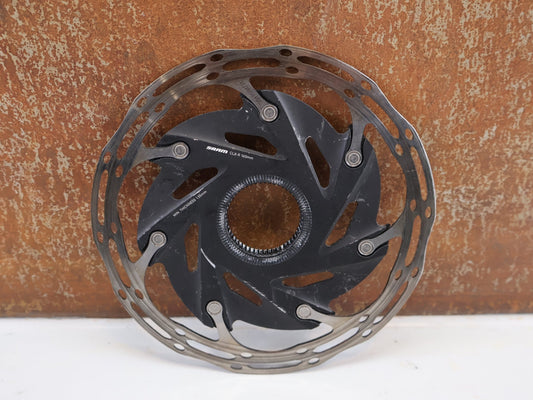 Bremsscheibe von Sram, SRAM CENTERLINE XR ROUNDED / 160MM / CENTERLOCK / ZWEITEILIG / 00.5018.122.003 vor USEDBIKES - OB.DE Hintergrund