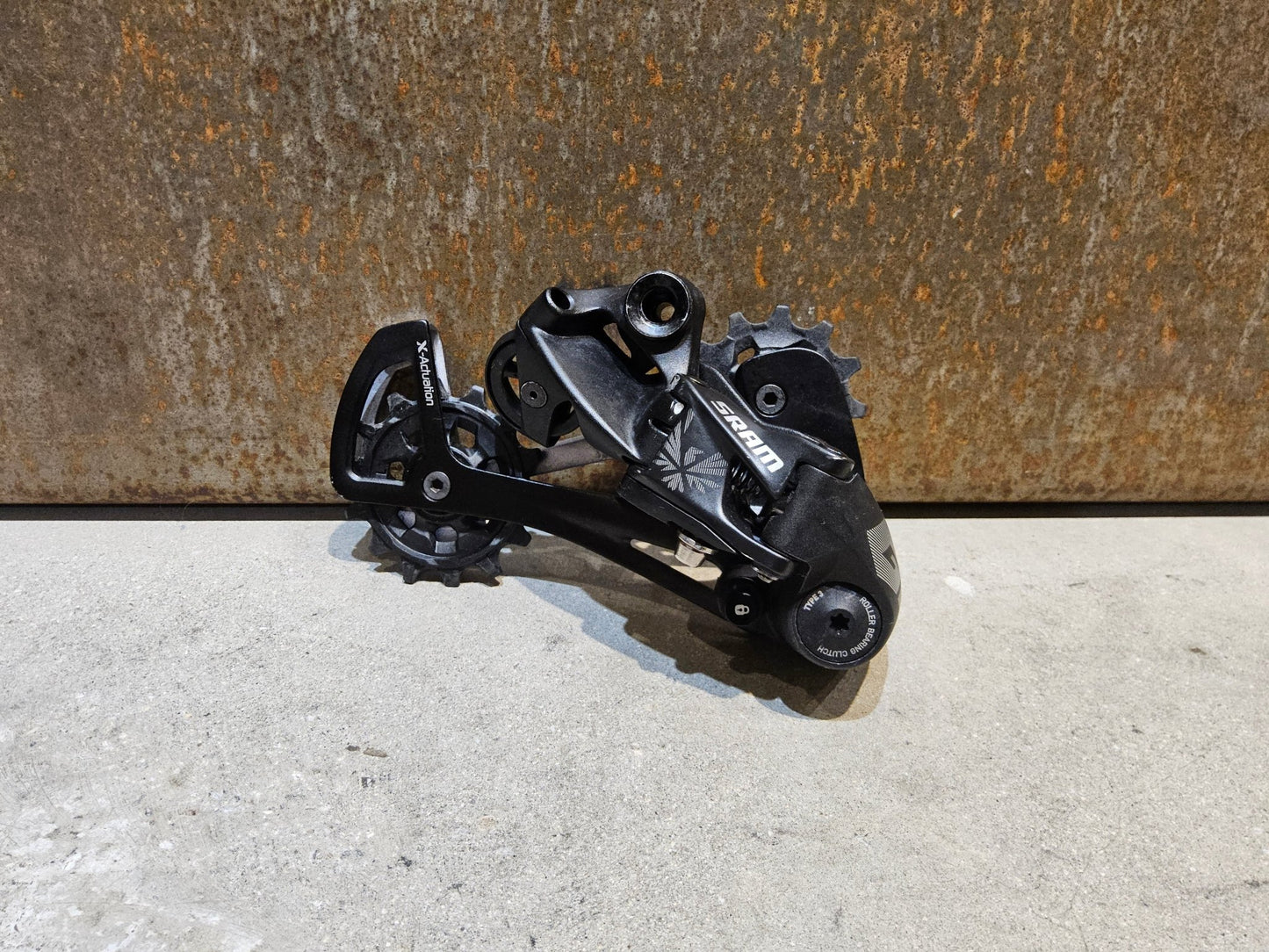 Schaltungsteile von Sram, SRAM GX EAGLE SCHALTWERK 12 FACH / MAX. 50 ZÄHNE vor USEDBIKES - OB.DE Hintergrund