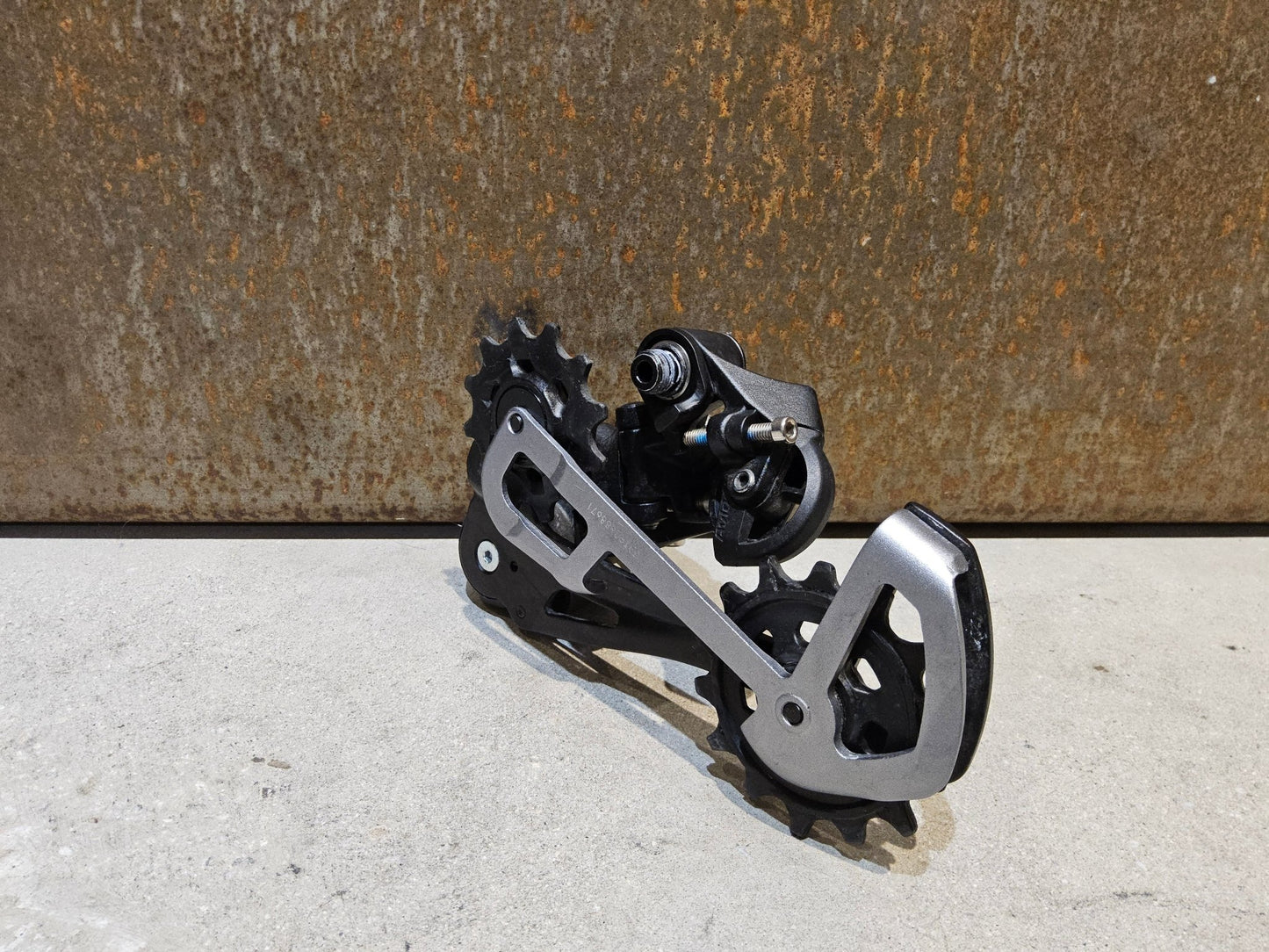 Schaltungsteile von Sram, SRAM GX EAGLE SCHALTWERK 12 FACH / MAX. 50 ZÄHNE vor USEDBIKES - OB.DE Hintergrund