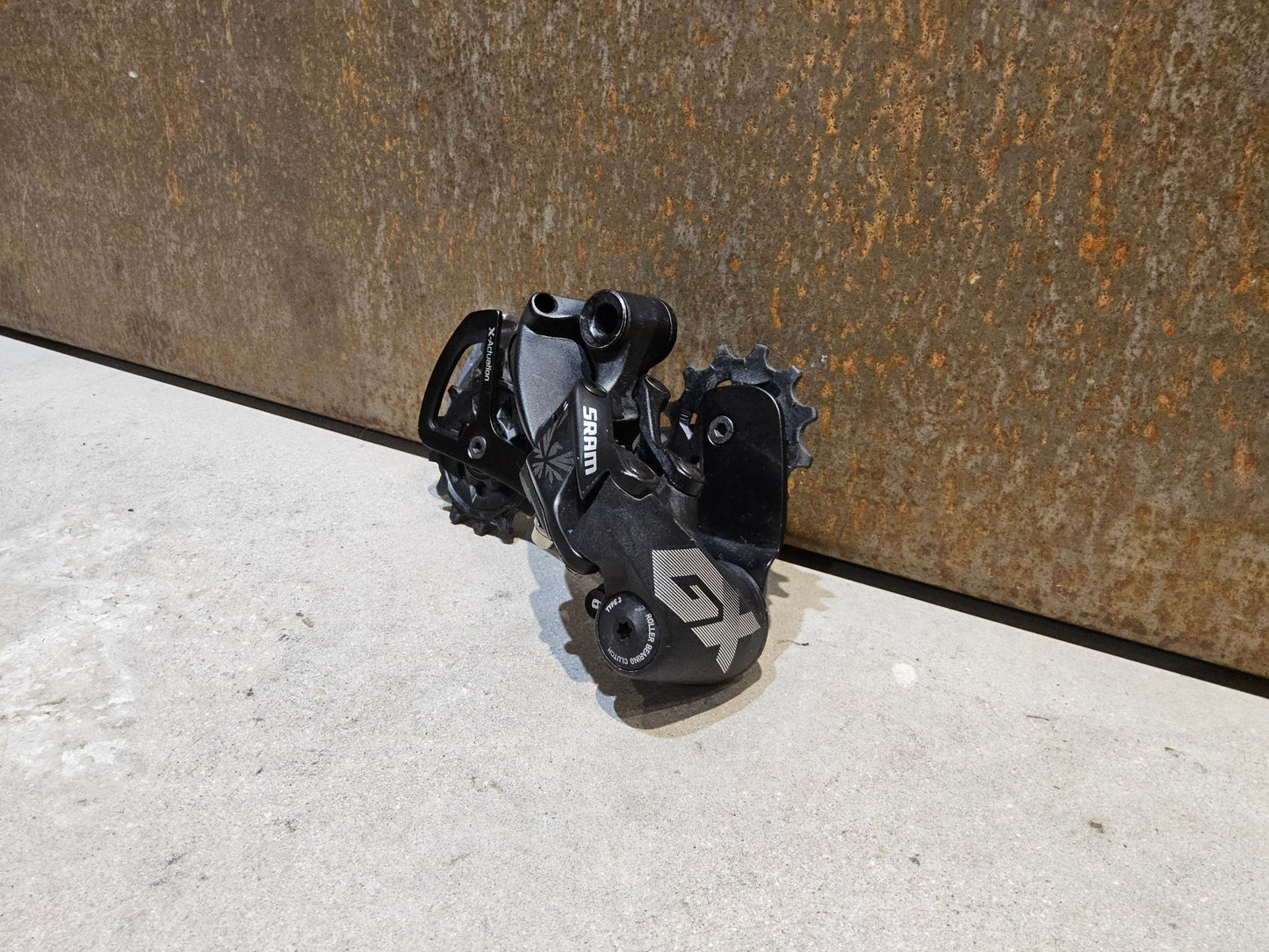 Schaltungsteile von Sram, SRAM GX EAGLE SCHALTWERK 12 FACH / MAX. 50 ZÄHNE vor USEDBIKES - OB.DE Hintergrund