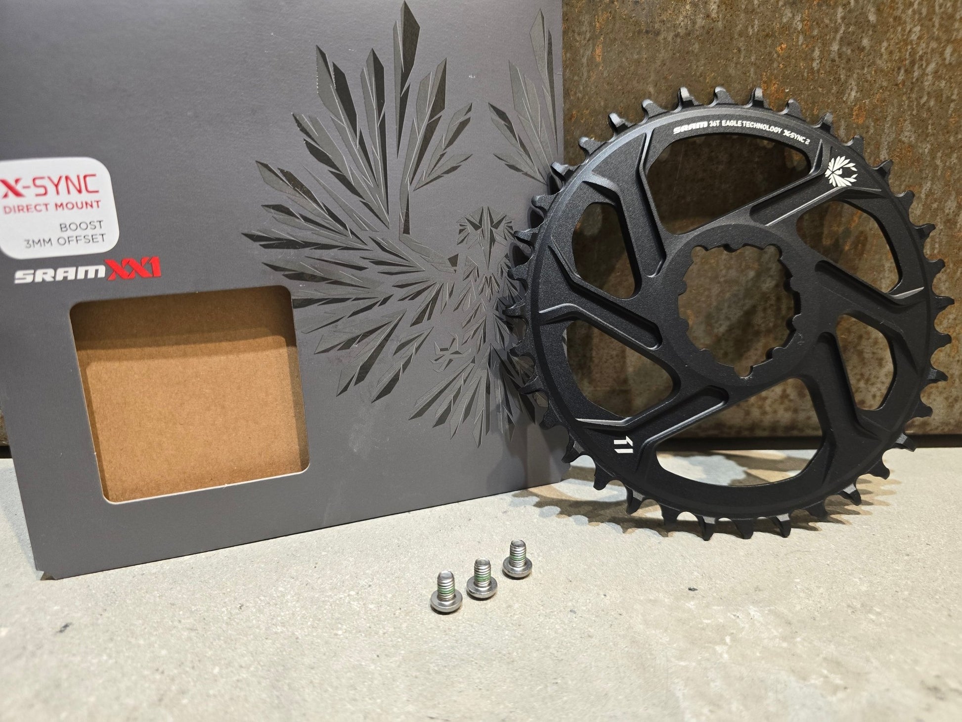 Kettenblatt von Sram, SRAM KETTENBLATT X - SYNC 2 XX1 EAGLE 3 BOLT DIRECT MOUNT 30T / 32T / 34T / 36T in variant_title vor USEDBIKES - OB.DE Hintergrund