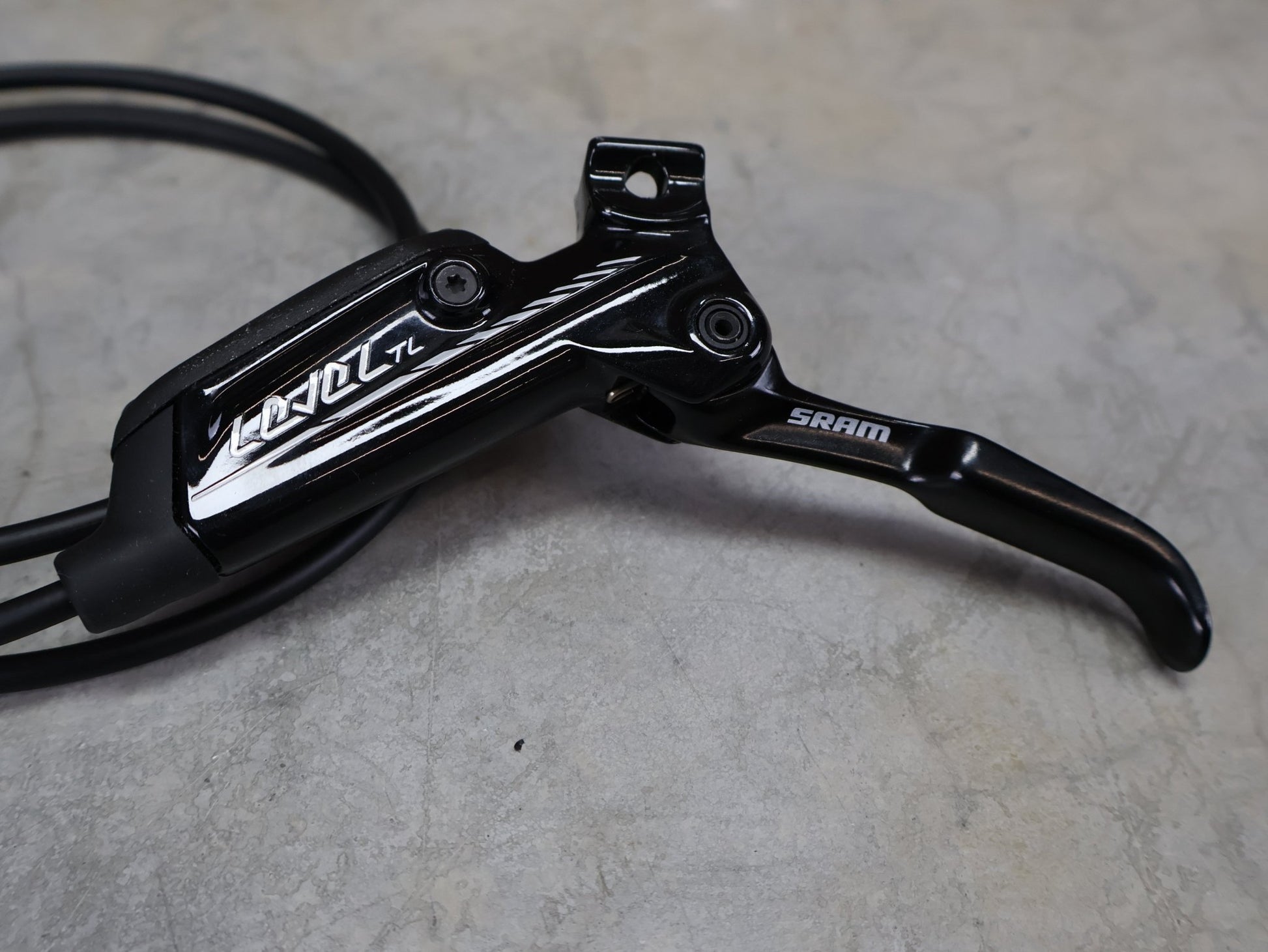 Bremse von Sram, SRAM LEVEL TL BREMSSET VORNE U. HINTEN SCHWARZ vor USEDBIKES - OB.DE Hintergrund