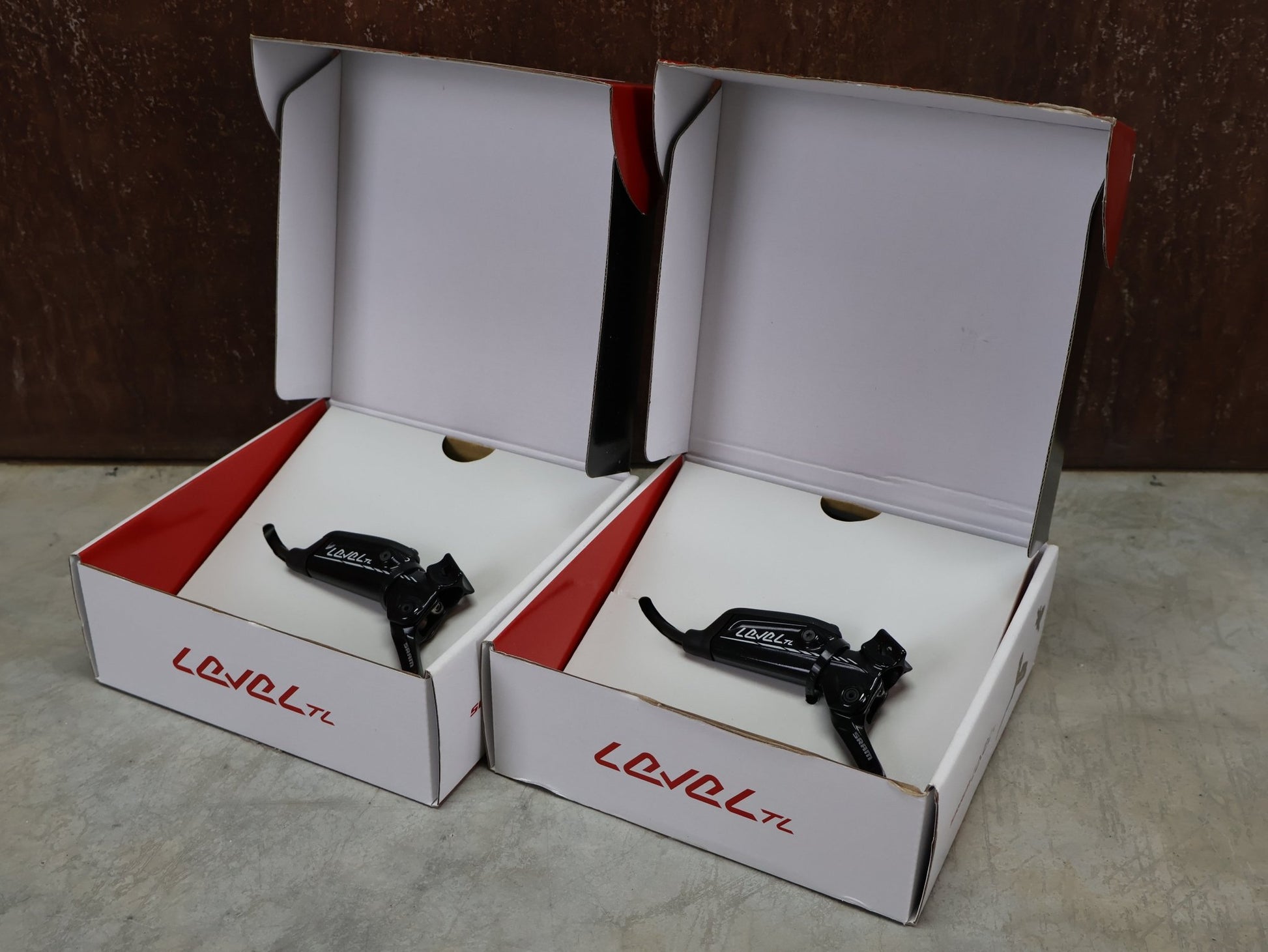 Bremse von Sram, SRAM LEVEL TL BREMSSET VORNE U. HINTEN SCHWARZ vor USEDBIKES - OB.DE Hintergrund