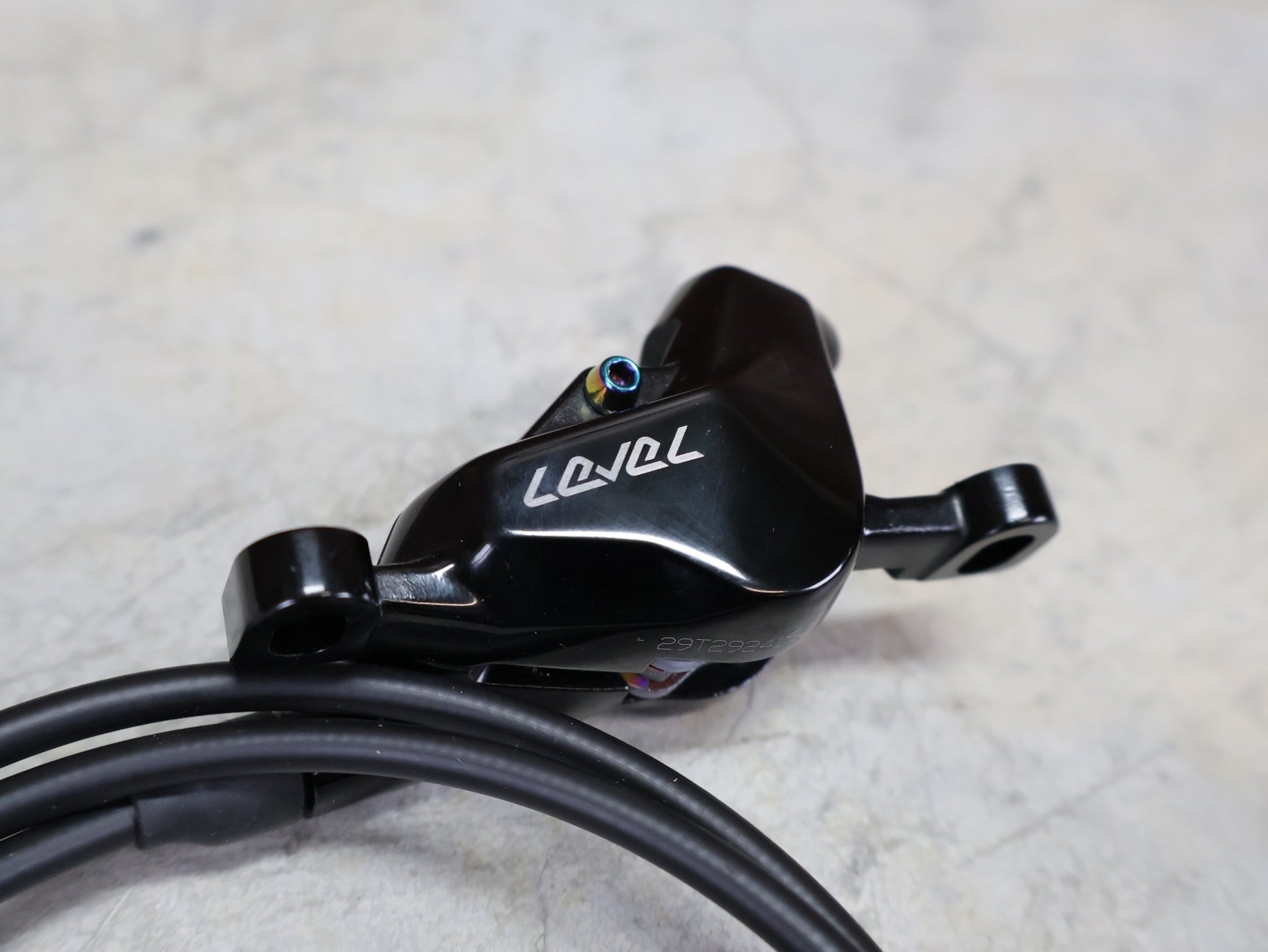 Bremse von Sram, SRAM LEVEL ULTIMATE BREMSSET VORNE U. HINTEN SCHWARZ / RAINBOW vor USEDBIKES - OB.DE Hintergrund