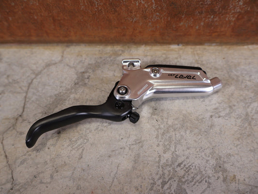 Bremse von Sram, SRAM LEVEL ULTIMATE STEALTH BREMSGRIFF C1 / CARBON CLEAR vor USEDBIKES - OB.DE Hintergrund