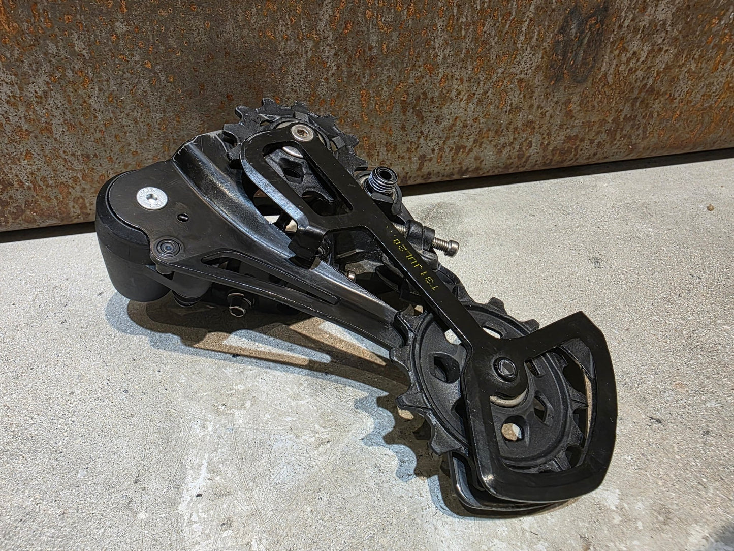 Schaltungsteile von Sram, SRAM NX EAGLE SCHALTWERK 12 FACH vor USEDBIKES - OB.DE Hintergrund