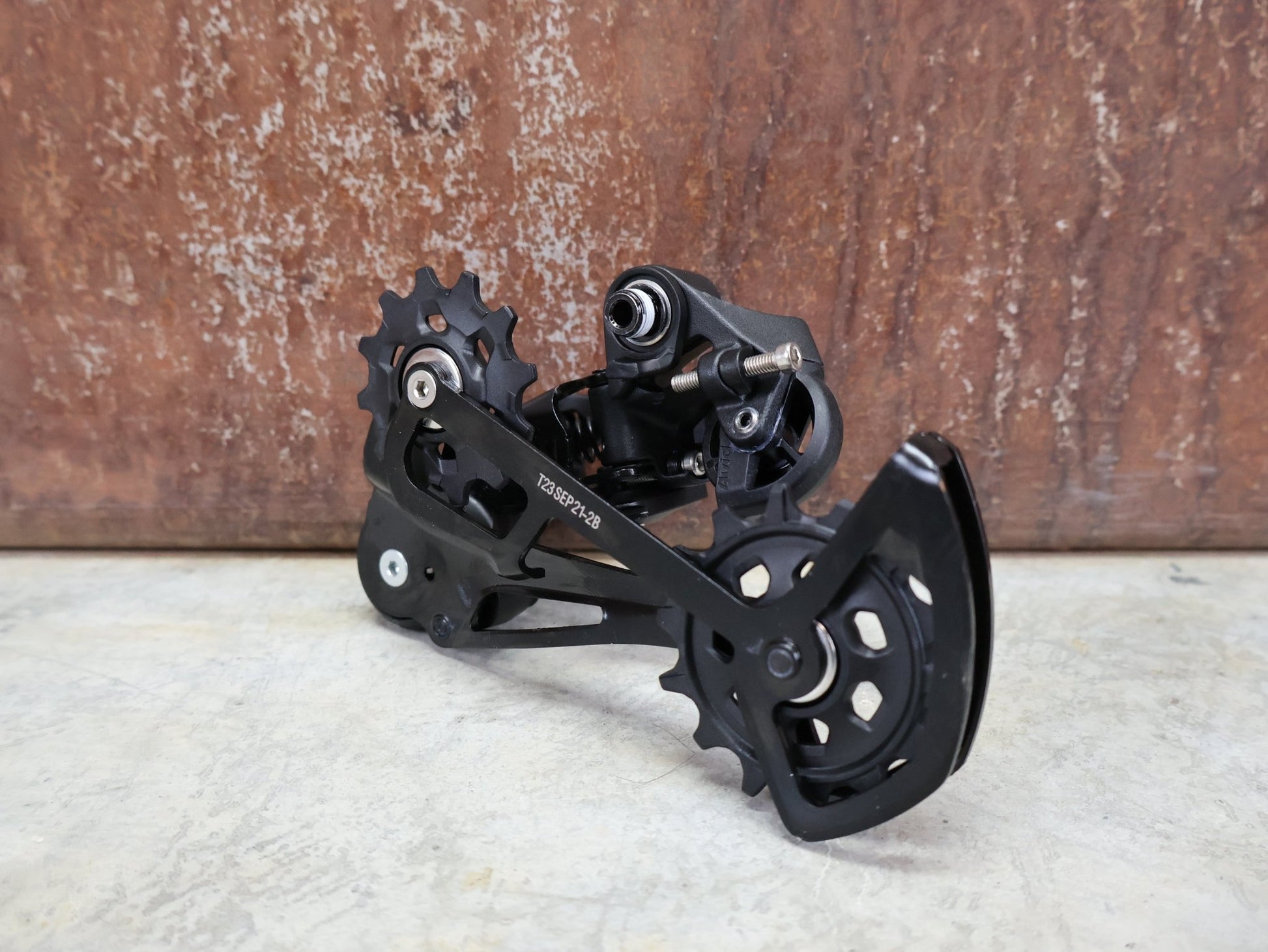 Schaltungsteile von Sram, SRAM NX EAGLE SCHALTWERK 12 FACH vor USEDBIKES - OB.DE Hintergrund