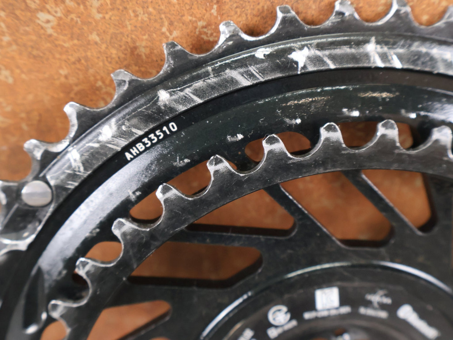 Kettenblatt von Sram, SRAM RED QUARQ AXS POWERMETER KIT 8 - BOLT SPIDER 2X12 52/39 ZÄHNE / BASTLERWARE vor USEDBIKES - OB.DE Hintergrund