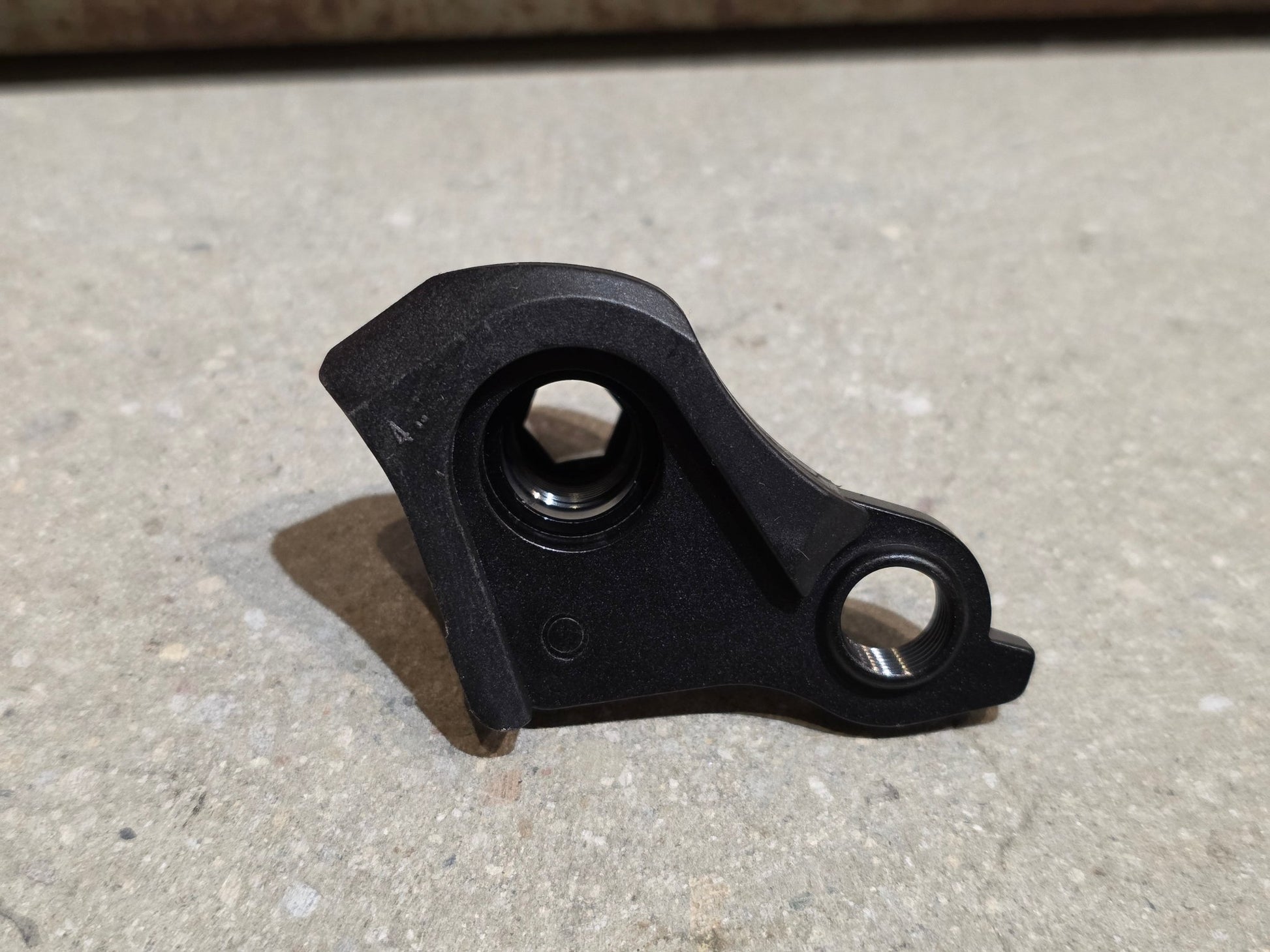 Zubehör von Sram, SRAM UDH UNIVERSAL SCHALTAUGE vor USEDBIKES - OB.DE Hintergrund