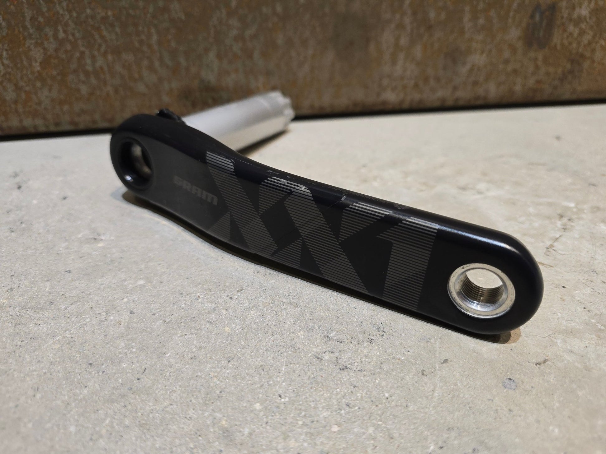 Kurbel von Sram, SRAM XX1 KURBELARM EAGLE DUB / 165MM / LINKS in variant_title vor USEDBIKES - OB.DE Hintergrund