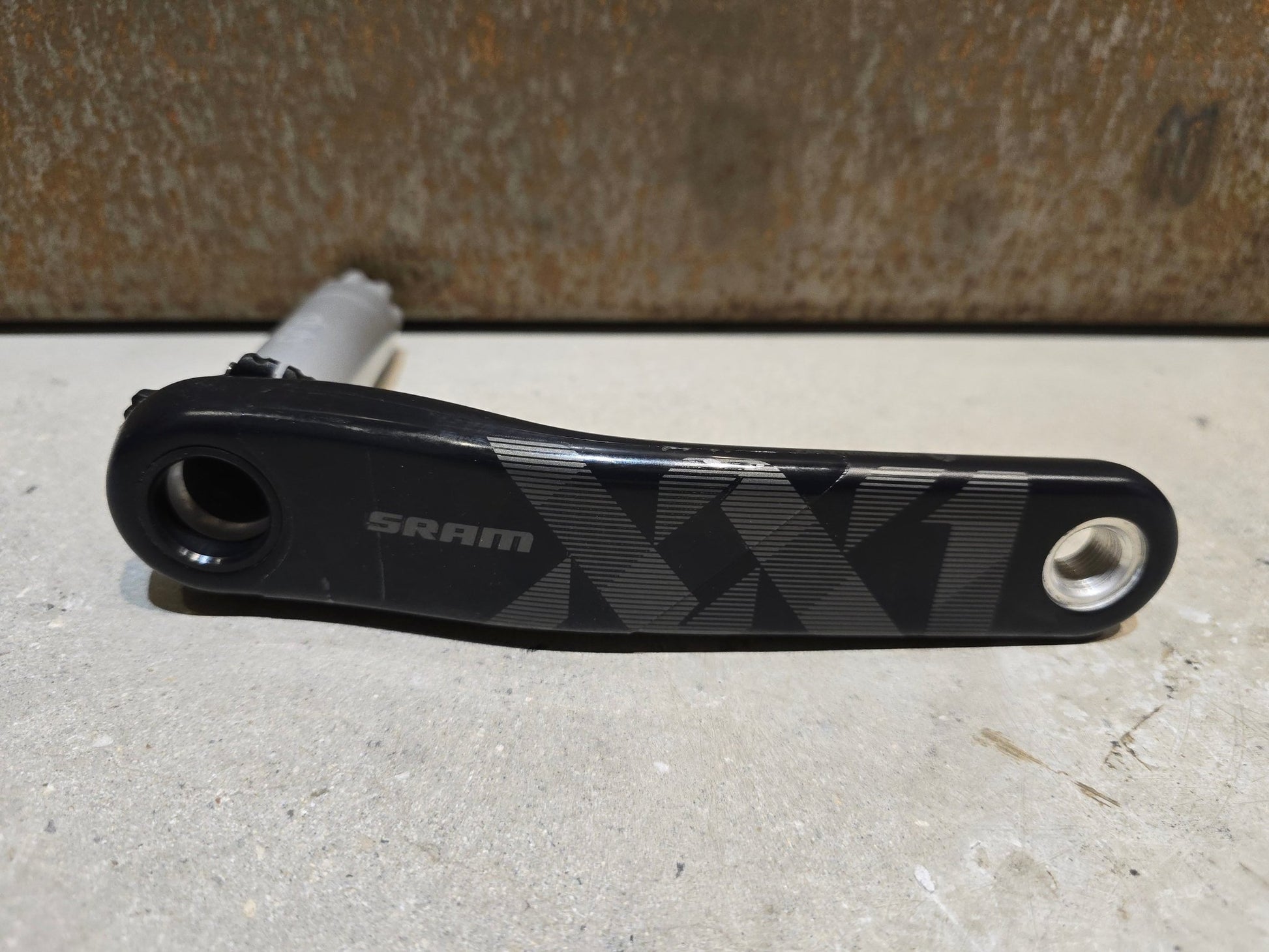 Kurbel von Sram, SRAM XX1 KURBELARM EAGLE DUB / 165MM / LINKS in variant_title vor USEDBIKES - OB.DE Hintergrund