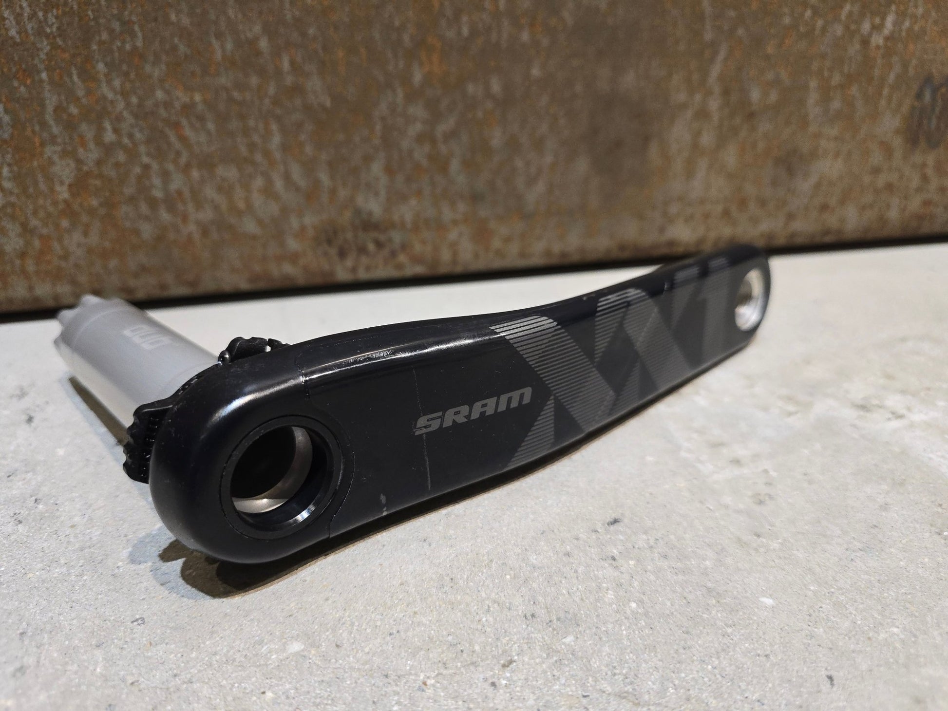 Kurbel von Sram, SRAM XX1 KURBELARM EAGLE DUB / 165MM / LINKS in variant_title vor USEDBIKES - OB.DE Hintergrund