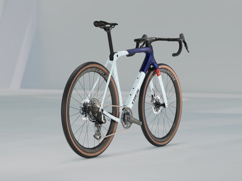 Gravel/Cyclocross von Trek, TREK CHECKMATE SLR 9 AXS / MATTE HEX BLUE / L vor USEDBIKES - OB.DE Hintergrund