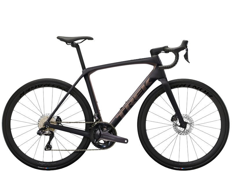 Rennrad von Trek, TREK DOMANE SL 7 GEN 4 / DARK WEB BLACK / 47CM vor USEDBIKES - OB.DE Hintergrund