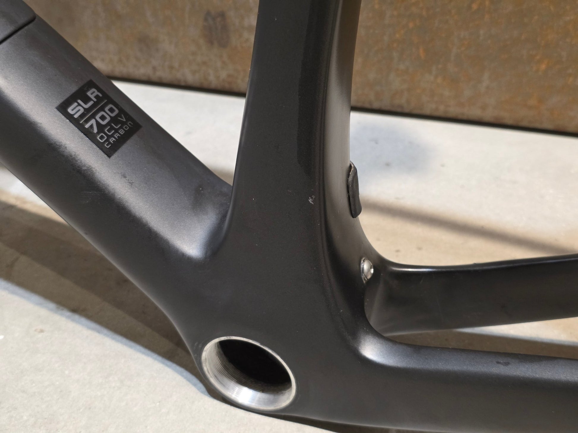 Rennradrahmen von Trek, TREK DOMANE SLR RAHMENSET 2020 - 21 / DISC / 58CM vor USEDBIKES - OB.DE Hintergrund