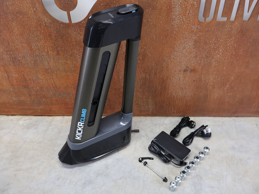 Rollentrainer & Zubehör von Wahoo, WAHOO KICKR CLIMB INDOOR GRADE SIMULATOR WFBKTR5 vor USEDBIKES - OB.DE Hintergrund