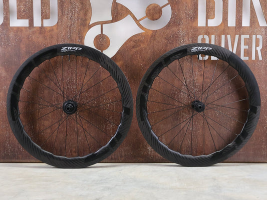 Laufrad/Laufradsatz von Zipp, ZIPP 454 NSW LAUFRADSATZ DISC vor USEDBIKES - OB.DE Hintergrund