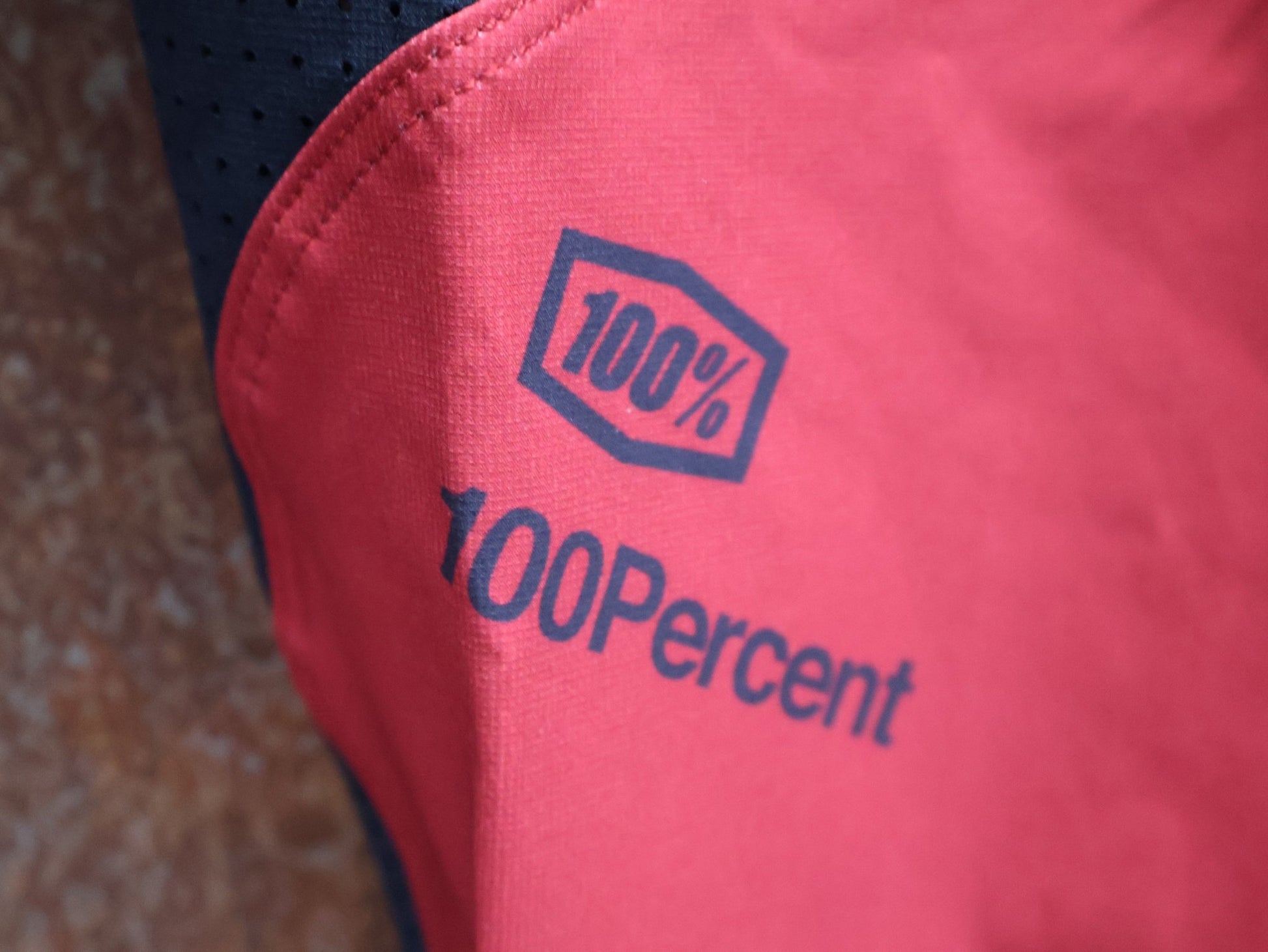 Hosen Herren von 100%, 100% – R - CORE X PANTS / RED - BLACK / TREK FACTORY RACING TEAM / 4 - WAY STRETCH vor USEDBIKES - OB.DE Hintergrund