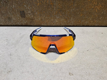 Brillen von 100%, 100 % SONNENBRILLE TREK TEAM EDITION S3 HIPER LENS vor USEDBIKES - OB.DE Hintergrund