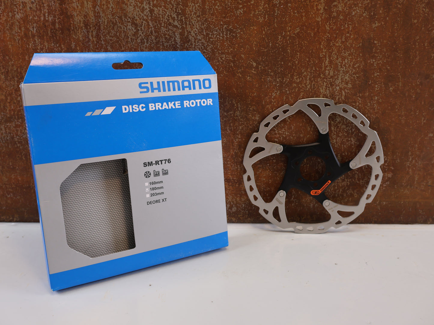 SHIMANO BRAKE DISC DEORE XT SM-RT76 / 6-BOLT / TWO-PIECE / 160MM OR 180MM