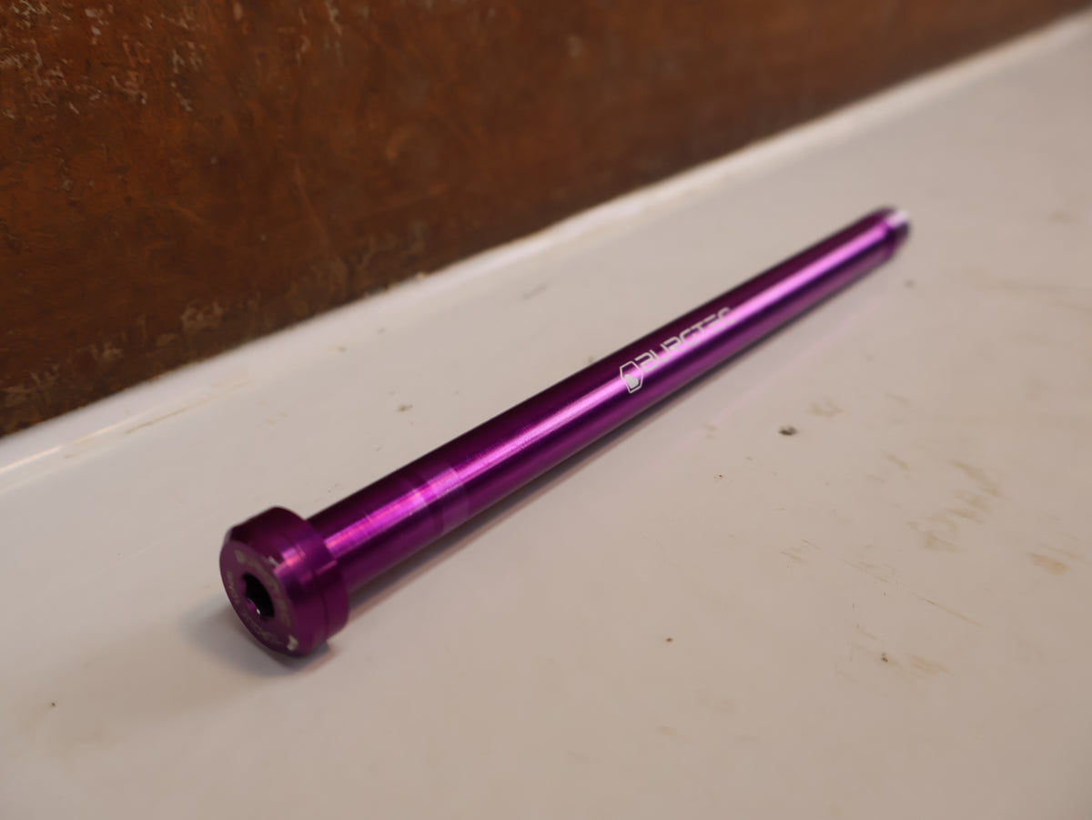 Burgtec Trek Steckachse 184.5mm M12x1.0 Purple Rain 10104