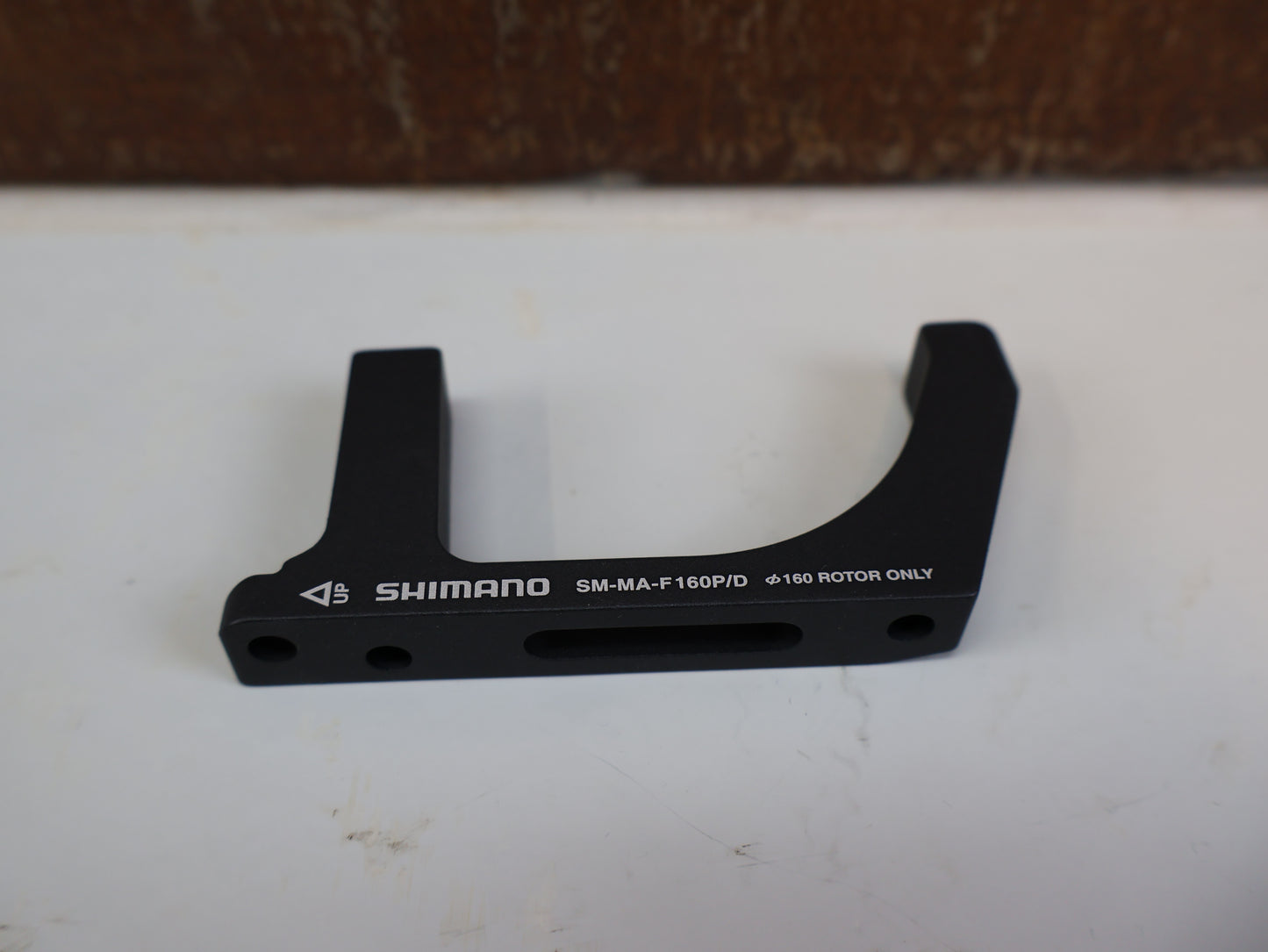SHIMANO ADAPTER SM-MA-F160P/D / FLATMOUNT GABEL AUF PM SATTEL / VR 160 MM