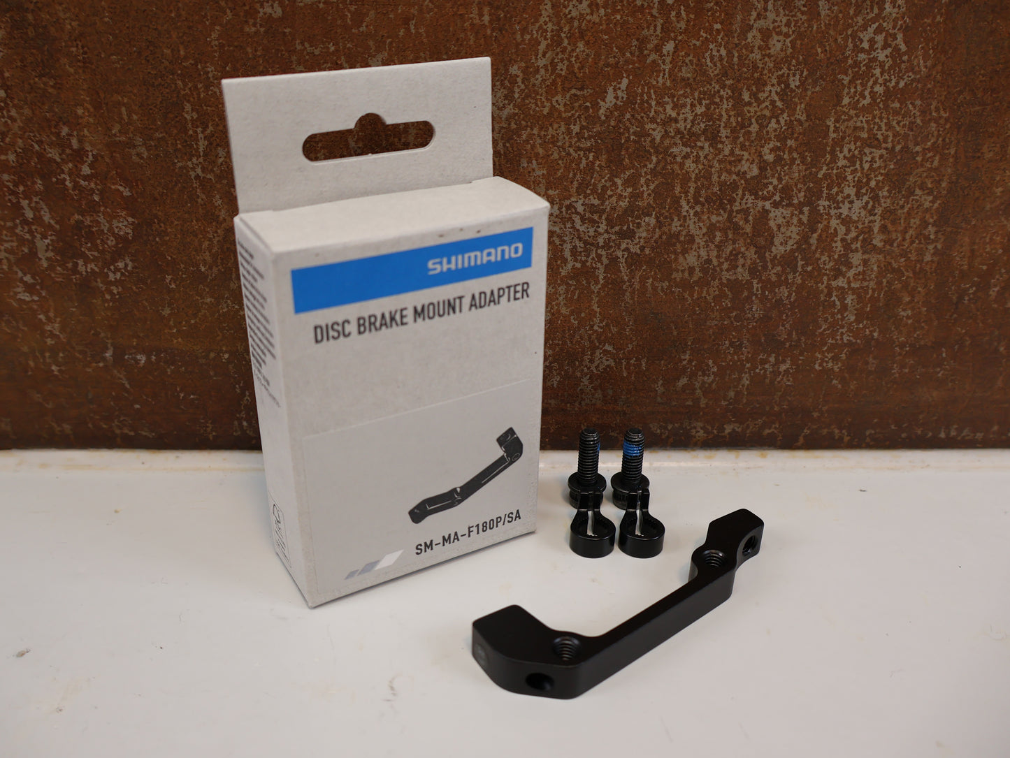 SHIMANO ADAPTER SM-MA-R180P/S / IS 2000 RAHMEN AUF PM BREMSSATTEL / HR 180 MM