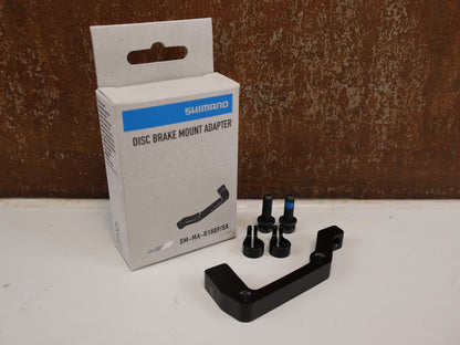 SHIMANO ADAPTER SM-MA-F180P/SA / IS 2000 GABEL AUF PM BREMSSATTEL / VR 180 MM