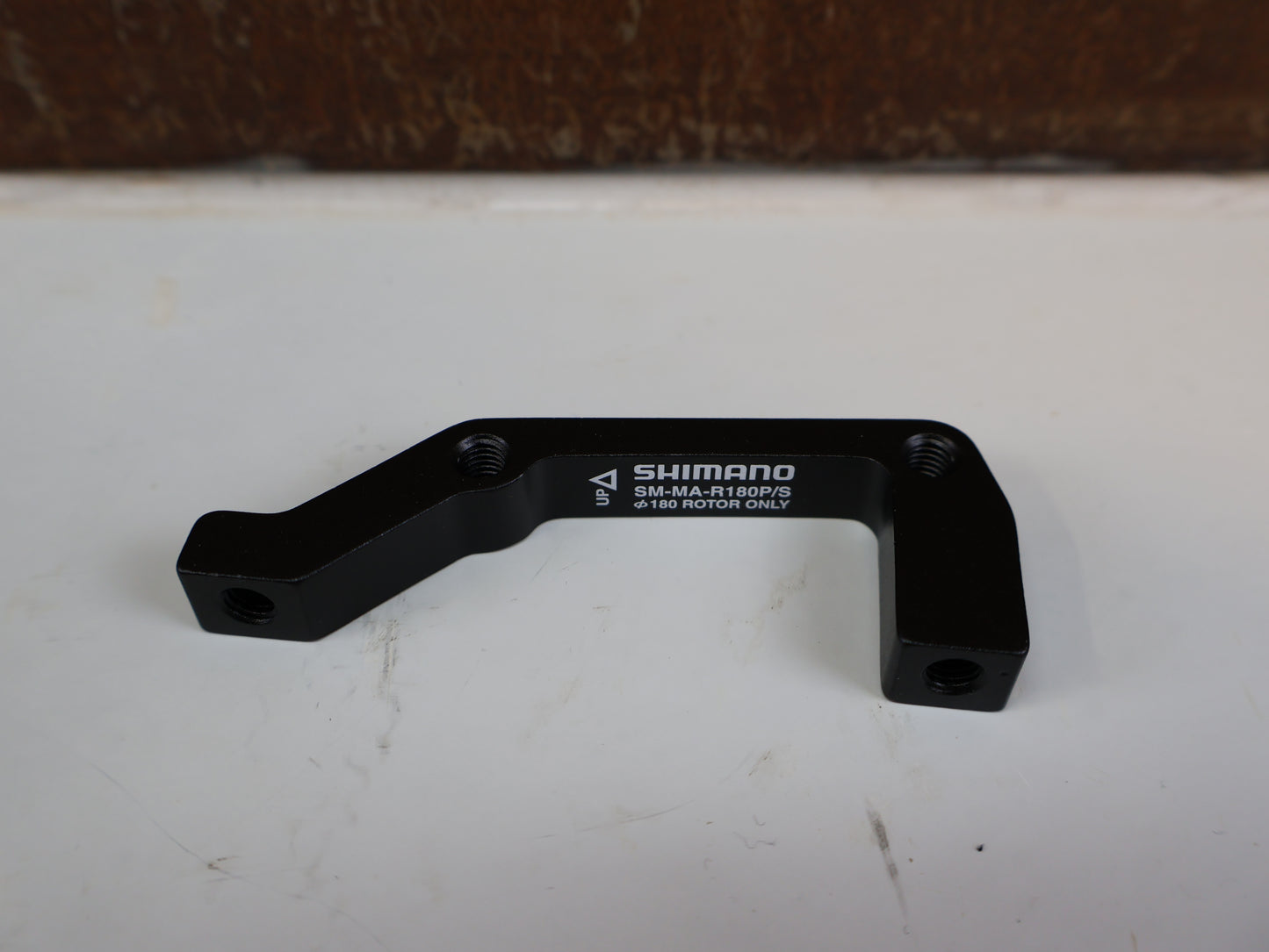 SHIMANO ADAPTER SM-MA-F180P/SA / IS 2000 GABEL AUF PM BREMSSATTEL / VR 180 MM