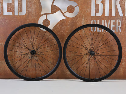 Laufrad/Laufradsatz von Bmc, BMC CRD 351 RENNRAD CARBON LAUFRADSATZ 35MM DISC XDR / TLR READY vor USEDBIKES-OB.DE Hintergrund