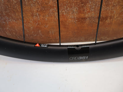 Laufrad/Laufradsatz von Bmc, BMC CRD 351 RENNRAD CARBON LAUFRADSATZ 35MM DISC XDR / TLR READY vor USEDBIKES-OB.DE Hintergrund