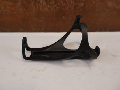 Trinkflaschen und Halter von Trek, Bontrager Bat Cage Flaschenhalter Recycled Nylon vor USEDBIKES-OB.DE Hintergrund
